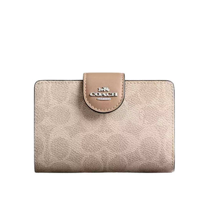 Cartera mediana broche