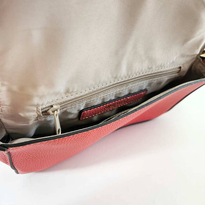 Crossbody clutch flap