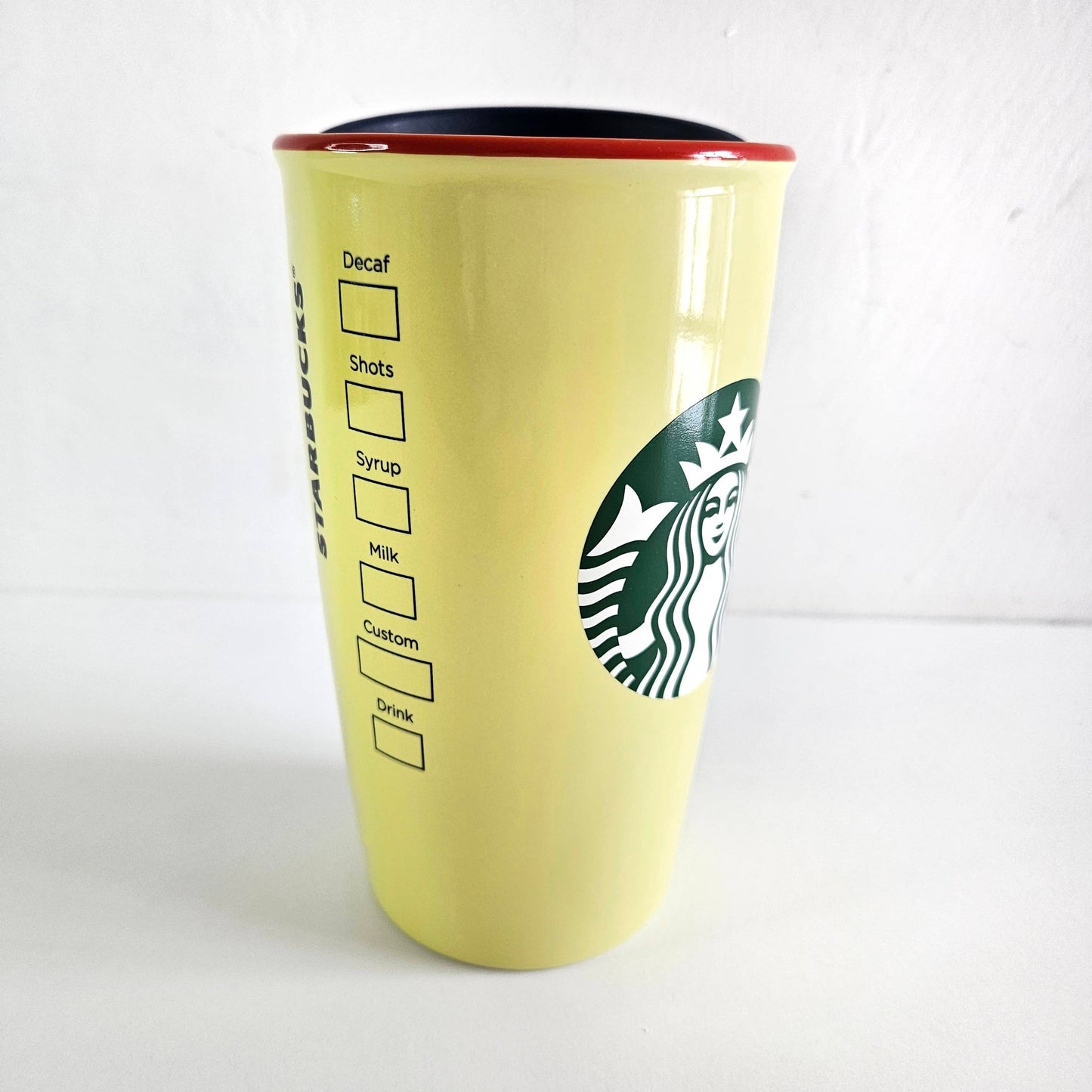 Vaso Star bucks de porcelana Magic Kingdom amarillo