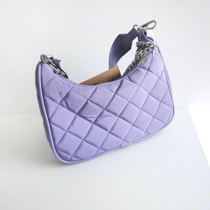 Crossbody acolchada lila