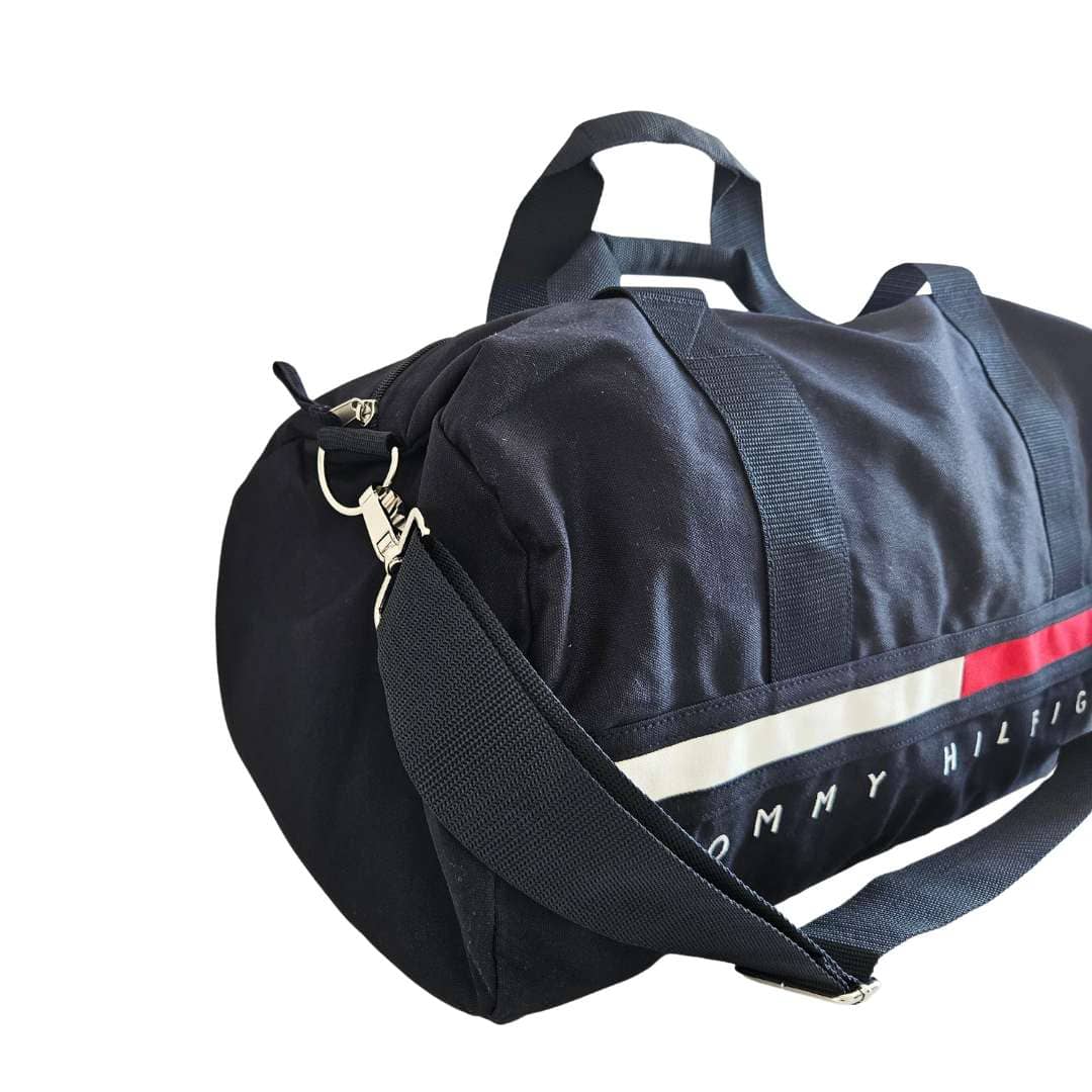 Bolso maleta de viaje con logo y banderas en tela.